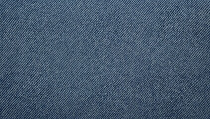 Detailed closeup of aged blue denim fabric, suitable for background use in design