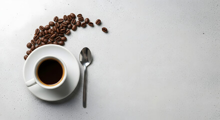 A white ceramic cup filled with black coffee sits on a matching saucer atop a light gray speckled surface