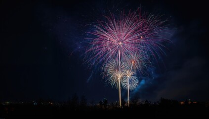 Colorful fireworks light up the night sky, a vibrant display of celebration