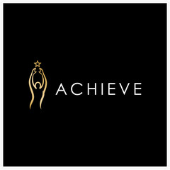 Achieve Your Goals Silhouette of a Person Holding a Star Upwards, Representing Success and Achievement