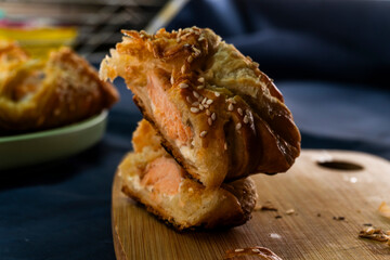 Salmon pie with puff pastry. Salmon. Fish pastry. Food concept