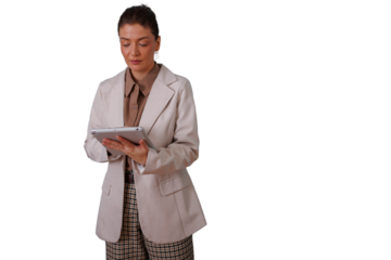 Businesswoman using digital tablet for work, managing data and technology, connecting via modern wireless device