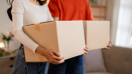 Asian Adult Couple Moving Box Together New Home Relocation Day Homeowners Unpacking Lifestyle Partnership Domestic Life Interior
