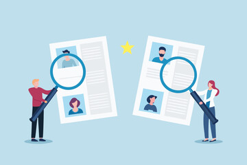 Two people using magnifying glasses to review resumes and profiles for hiring and recruitment