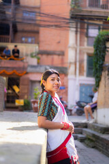 Newari Girl in Traditional Attire Strolling Through Patan Durbar Square