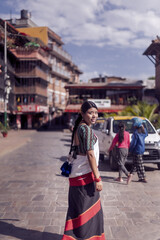 Newari Girl in Traditional Attire Strolling Through Patan Durbar Square