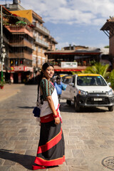 Newari Girl in Traditional Attire Strolling Through Patan Durbar Square