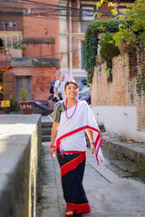 Newari Girl in Traditional Attire Strolling Through Patan Durbar Square