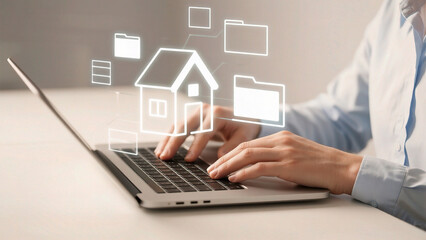 Person working on laptop with digital house icons