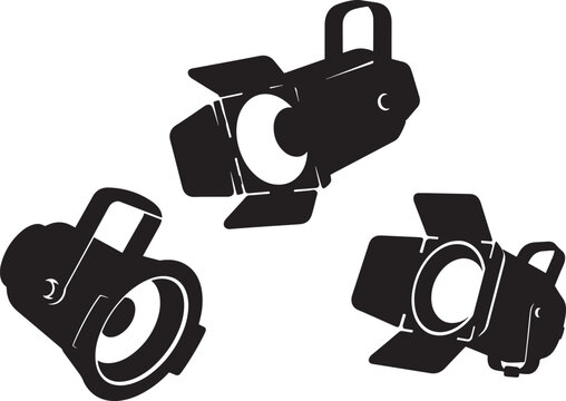 Three black silhouette stage lighting spotlights isolated on transparent background