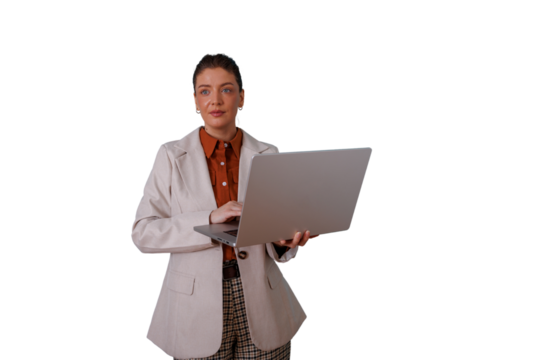 Professional businesswoman standing, working on laptop, managing business, looking confident and focused