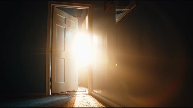 A half-open door revealing bright light represents opportunity, discovery, and hope. Great for motivation, leadership, and spiritual growth visuals.
