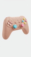 Textured pink gaming controller features brightly colored buttons isolated on a light background