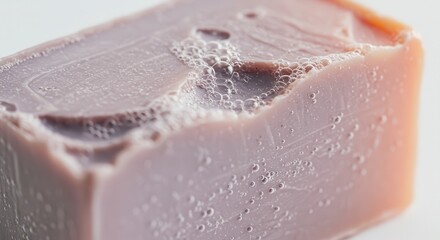 Fototapeta premium Solid block of handmade cleansing product features surface moisture and small air pockets