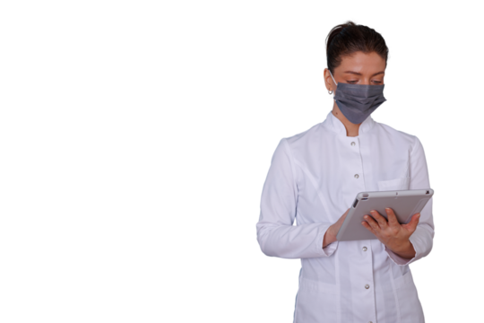 Female doctor wearing face mask and lab coat, holding digital tablet for medical consultation, health data, transparent background