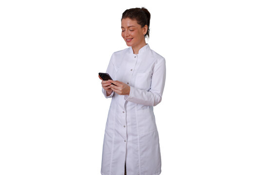 Female doctor wearing lab coat and using smartphone, smiling and scrolling on social media with transparent background