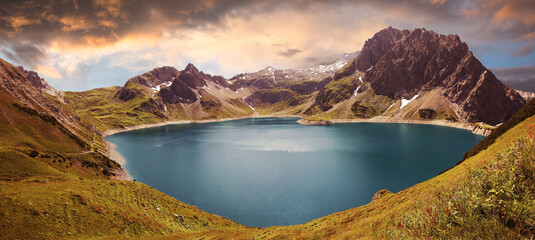 artificial lake Lunersee. autumnal alpine landscape Vorarlberg, austria, at sunset