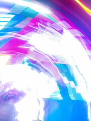 Colorful, fluorescent swirls of light create a dynamic and energetic abstract composition. Blurred streaks of purple, blue, and gold give the impression of rapid, surreal movement.