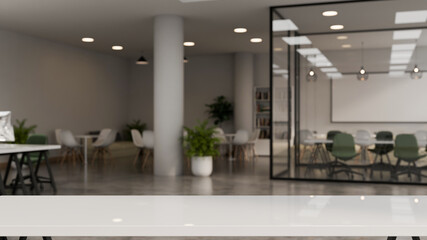 3d render Empty white table with open space office interior skyscraper background