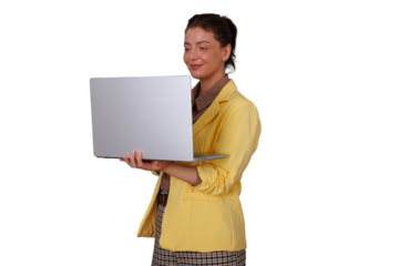 Businesswoman in a yellow blazer holding and looking at a laptop, staying connected and managing tasks on a transparent background