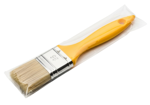 New paint brush with yellow handle, bristles covered in plastic packaging, isolated on transparent background