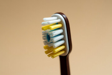 Detailed macro view of a multi colored toothbrush bristles ready for effective dental hygiene and a clean smile