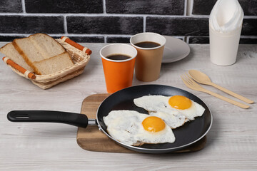 Breakfast scrambled eggs and fresh coffee