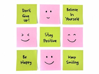 Positive message on colorful sticky note with smile emoji. Positive way concept 