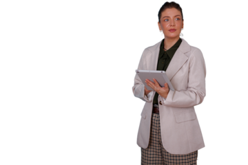 Businesswoman standing, holding a tablet, looking away with a confident expression, using digital corporate technology, transparent background
