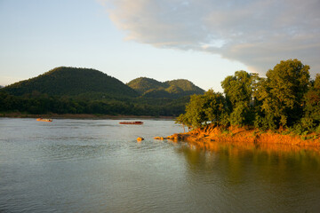 At sunset, in Luang Prabang (Laos), where the M&eacute;kong and the Nam Khan rivers meet.