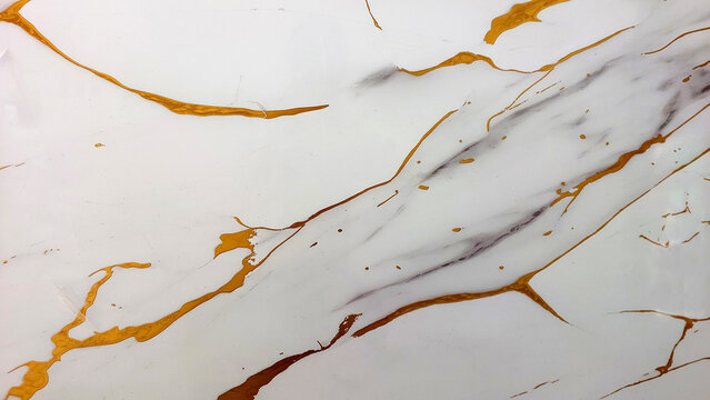 Top view of a glass of frothy milk tea or coffee on a green-rimmed saucer on dark wood.