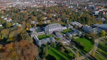Berlin botanical garden showing glasshouses. Majestic aerial view flight drone