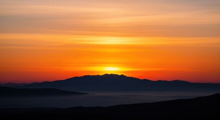 Fototapeta premium Distant Mountain Silhouette under Orange Dawn Sky. Minimal Landscape.