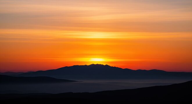 Distant Mountain Silhouette under Orange Dawn Sky. Minimal Landscape.