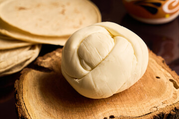 Traditional delicious Oaxaca cheese or Quesillo. Mexican food