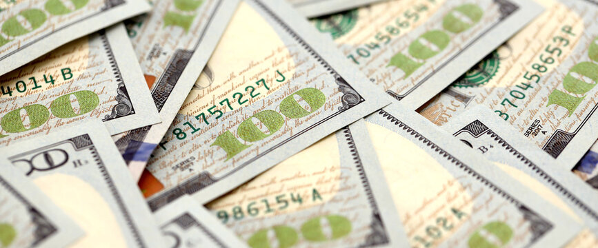 United States Dollar currency money bills. USD currency banknotes in stack with different denomination close up - Powered by Adobe