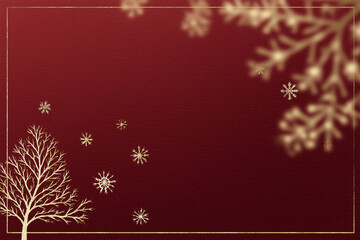 Elegant Christmas card design featuring a gold tree outline on deep wine red background with blurred silver snowflakes