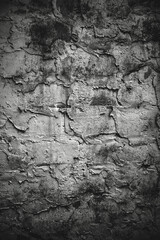 Rough cement plaster wall texture with gritty surface and natural imperfections, ideal for backgrounds and construction themes.