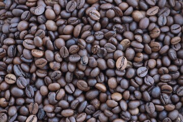 Freshly Roasted Coffee Beans Background. Espresso Brewing in Cafe