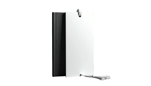 A stark, minimalist composition featuring a partially obscured book and a blank white tag