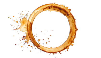 Brown coffee stain ring shape with splatters on black background