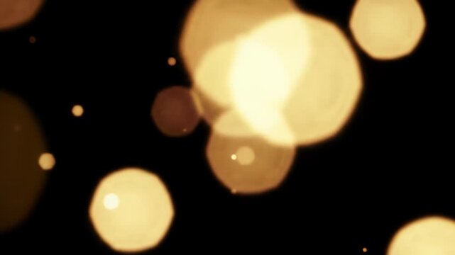 A slow cinematic dolly push-in video captures shimmering warm golden and amber bokeh lights against a deep charcoal and midnight blue backdrop, featuring creamy soft-focused orbs in foreground,