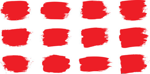 Collection of twelve vibrant red paint brush stroke textures and splatters on a white background