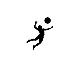 Silhouette of a volleyball player jumping and spiking the ball during a game
