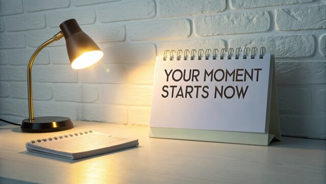 Motivational desk calendar with bright glowing light and quote