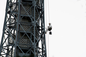 Climber on the self support cell tower