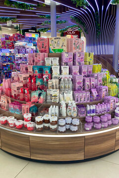 The glossy Primor shop on Larios Street in Malaga, Spain, shines with elegant displays of perfumes, cosmetics, and beauty products.