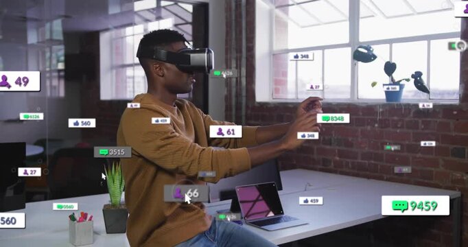 Man with VR headset sitting on desk, floating AR UI appearing, growing, testing social metrics