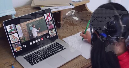 Child with headset writing, teacher pointing causing animated map overlay on laptop for geography - Powered by Adobe