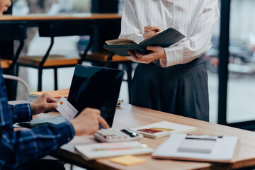 Business interaction: Capturing a moment of collaborative work and discussion within a business...